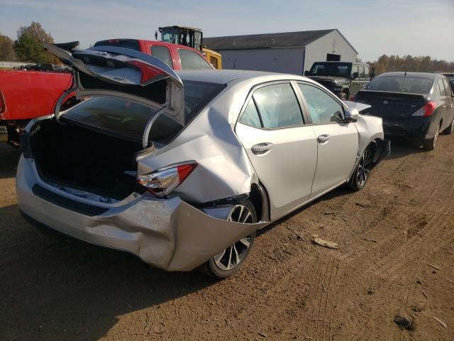 Photo 3 VIN: 2T1BURHE7JC071057 - TOYOTA COROLLA L 