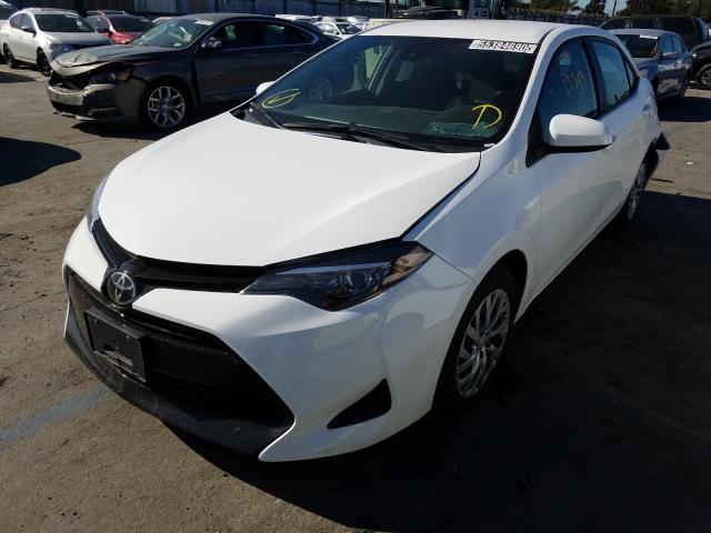 Photo 1 VIN: 2T1BURHE7JC072600 - TOYOTA COROLLA L 