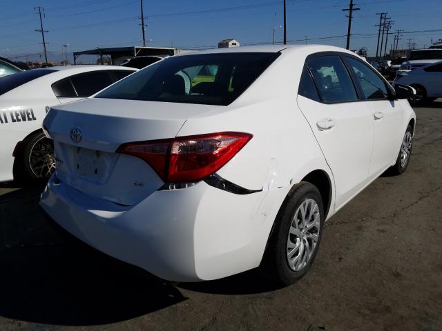 Photo 3 VIN: 2T1BURHE7JC072600 - TOYOTA COROLLA L 