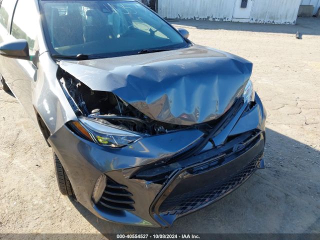 Photo 5 VIN: 2T1BURHE7JC083208 - TOYOTA COROLLA 