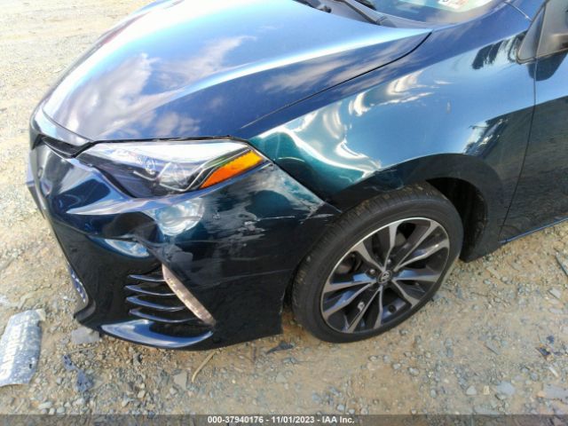 Photo 5 VIN: 2T1BURHE7JC084052 - TOYOTA COROLLA 