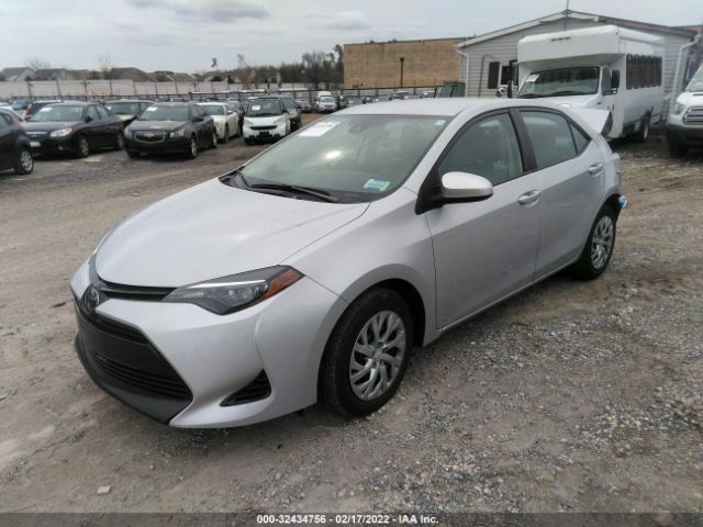 Photo 1 VIN: 2T1BURHE7JC087386 - TOYOTA COROLLA 