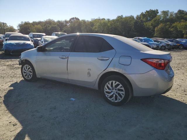 Photo 1 VIN: 2T1BURHE7JC098291 - TOYOTA COROLLA L 