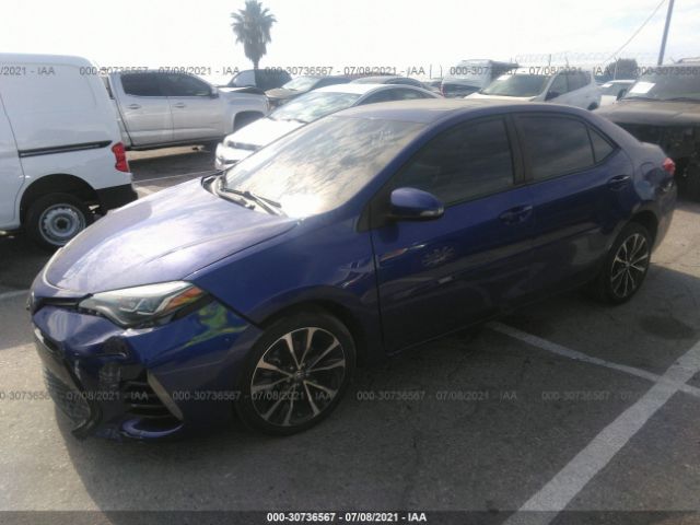 Photo 1 VIN: 2T1BURHE7JC970470 - TOYOTA COROLLA 