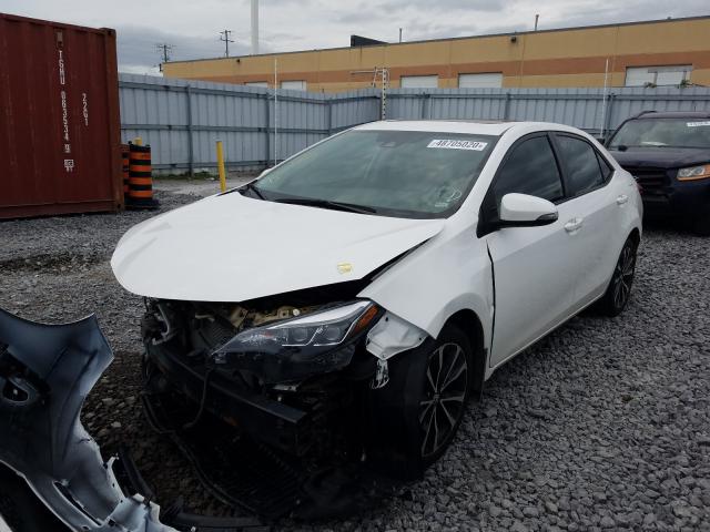 Photo 1 VIN: 2T1BURHE7JC973434 - TOYOTA COROLLA L 