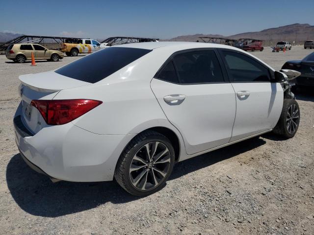 Photo 2 VIN: 2T1BURHE7KC128861 - TOYOTA COROLLA L 