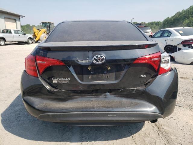 Photo 5 VIN: 2T1BURHE7KC129959 - TOYOTA COROLLA L 