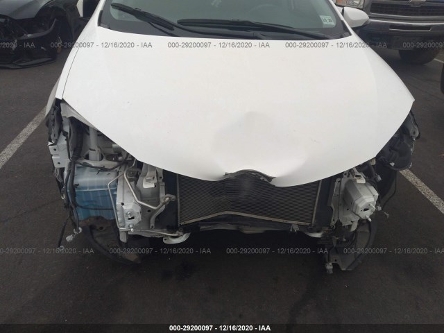 Photo 5 VIN: 2T1BURHE7KC135082 - TOYOTA COROLLA 