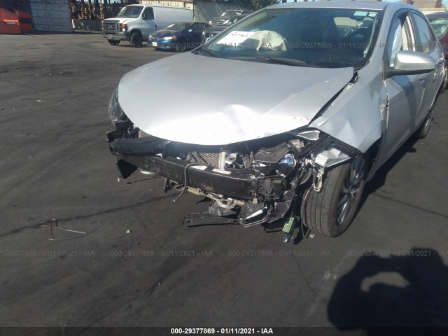 Photo 5 VIN: 2T1BURHE7KC141089 - TOYOTA COROLLA 