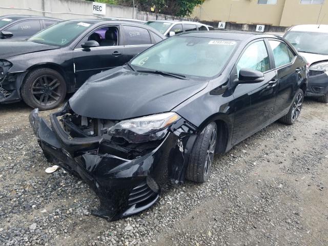 Photo 1 VIN: 2T1BURHE7KC159995 - TOYOTA COROLLA L 