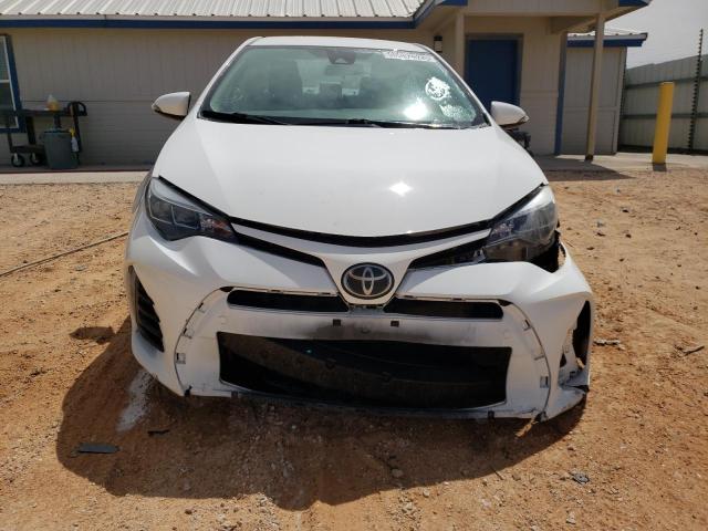 Photo 4 VIN: 2T1BURHE7KC211111 - TOYOTA COROLLA L 