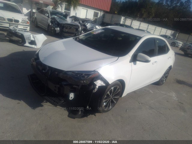 Photo 1 VIN: 2T1BURHE7KC221119 - TOYOTA COROLLA 