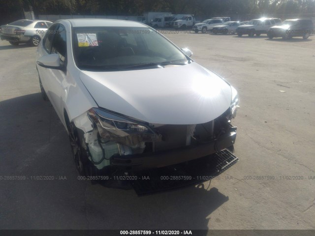 Photo 5 VIN: 2T1BURHE7KC221119 - TOYOTA COROLLA 