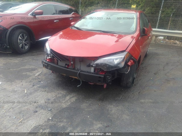 Photo 5 VIN: 2T1BURHE7KC224912 - TOYOTA COROLLA 