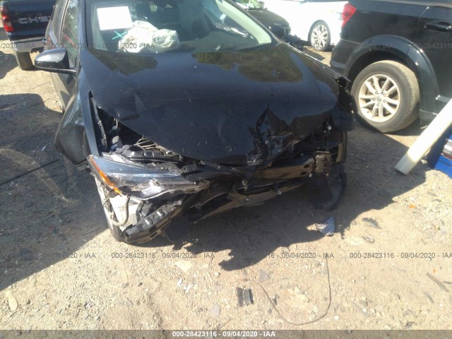 Photo 5 VIN: 2T1BURHE7KC230161 - TOYOTA COROLLA 