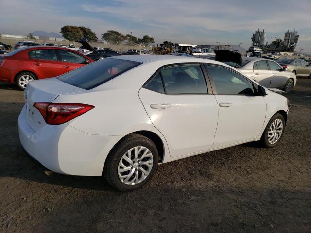 Photo 2 VIN: 2T1BURHE7KC240012 - TOYOTA COROLLA L 