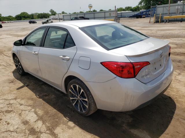 Photo 2 VIN: 2T1BURHE7KC240933 - TOYOTA COROLLA L 