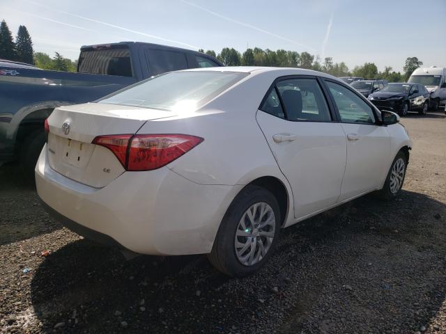 Photo 3 VIN: 2T1BURHE7KC242066 - TOYOTA COROLLA L 