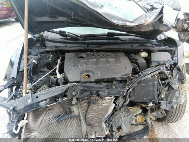 Photo 9 VIN: 2T1BURHE8EC048456 - TOYOTA COROLLA 