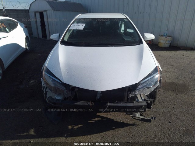 Photo 5 VIN: 2T1BURHE8JC032199 - TOYOTA COROLLA 