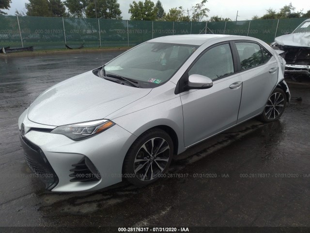 Photo 1 VIN: 2T1BURHE8JC044093 - TOYOTA COROLLA 