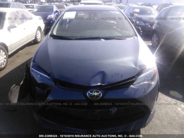 Photo 5 VIN: 2T1BURHE8JC067938 - TOYOTA COROLLA 