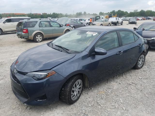 Photo 1 VIN: 2T1BURHE8JC069771 - TOYOTA COROLLA L 