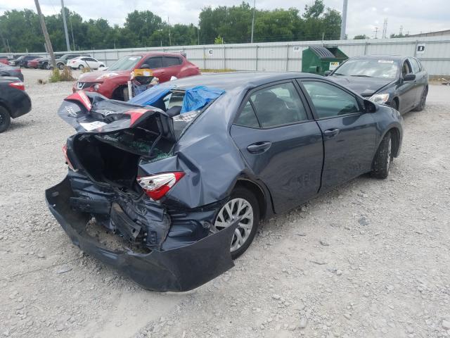 Photo 3 VIN: 2T1BURHE8JC069771 - TOYOTA COROLLA L 