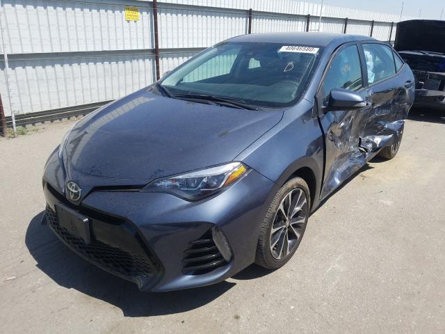 Photo 1 VIN: 2T1BURHE8JC082908 - TOYOTA COROLLA L 