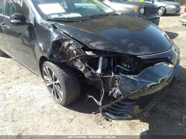 Photo 5 VIN: 2T1BURHE8JC086506 - TOYOTA COROLLA 