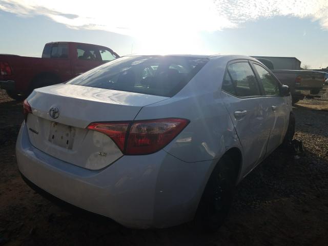 Photo 3 VIN: 2T1BURHE8JC088899 - TOYOTA COROLLA L 