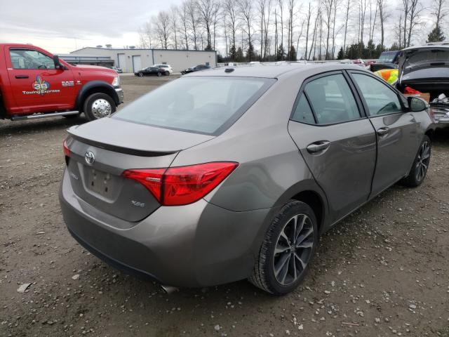 Photo 3 VIN: 2T1BURHE8JC106589 - TOYOTA COROLLA L 