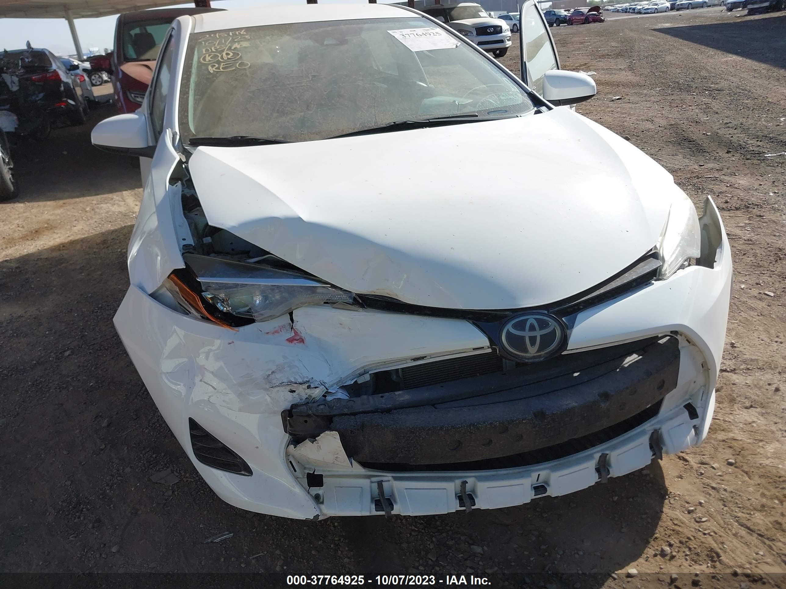 Photo 5 VIN: 2T1BURHE8JC110688 - TOYOTA COROLLA 