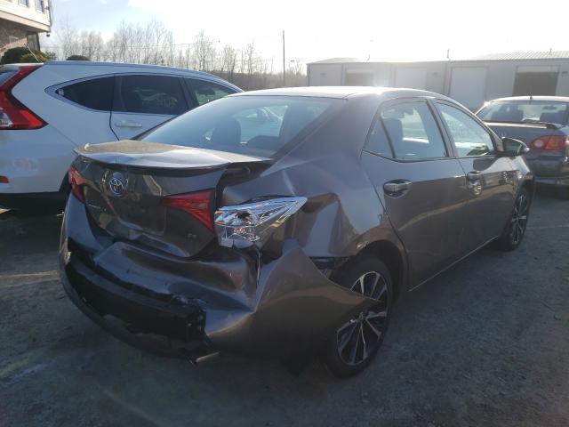 Photo 3 VIN: 2T1BURHE8JC124414 - TOYOTA COROLLA L 