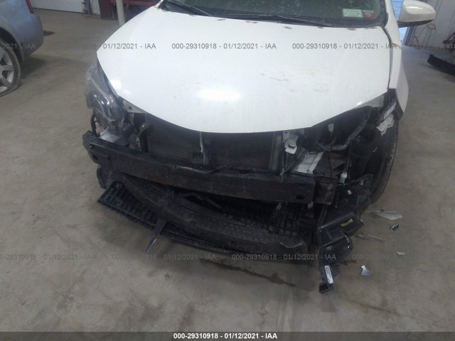 Photo 5 VIN: 2T1BURHE8JC972700 - TOYOTA COROLLA 