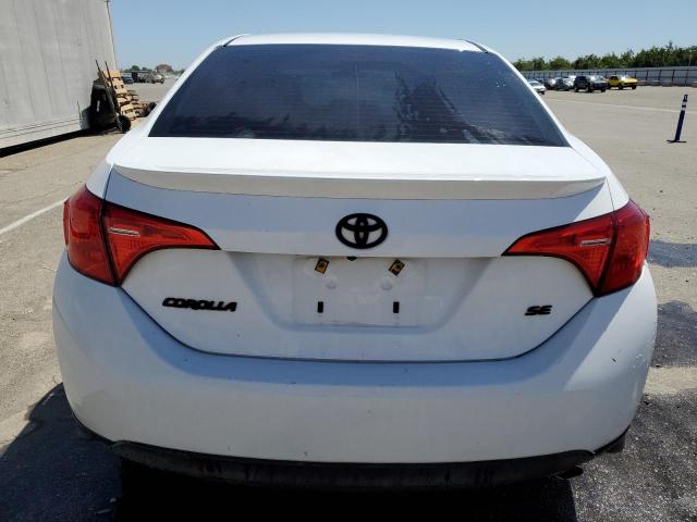 Photo 5 VIN: 2T1BURHE8JC991764 - TOYOTA COROLLA 