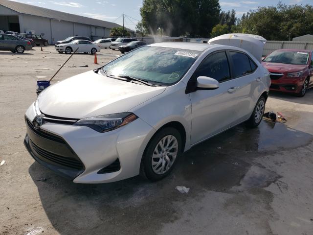 Photo 1 VIN: 2T1BURHE8KC127945 - TOYOTA COROLLA L 