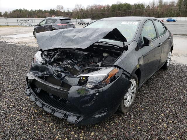 Photo 1 VIN: 2T1BURHE8KC134281 - TOYOTA COROLLA L 