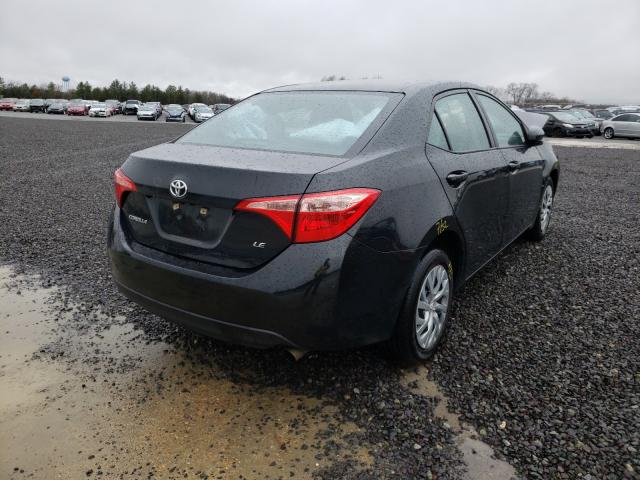 Photo 3 VIN: 2T1BURHE8KC134281 - TOYOTA COROLLA L 