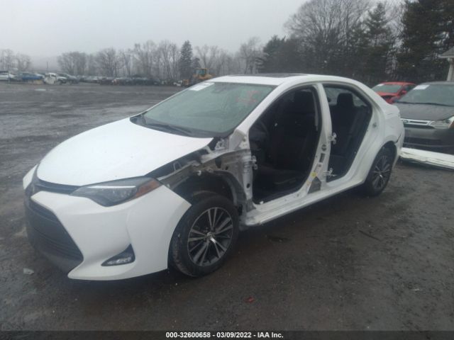 Photo 5 VIN: 2T1BURHE8KC138475 - TOYOTA COROLLA 