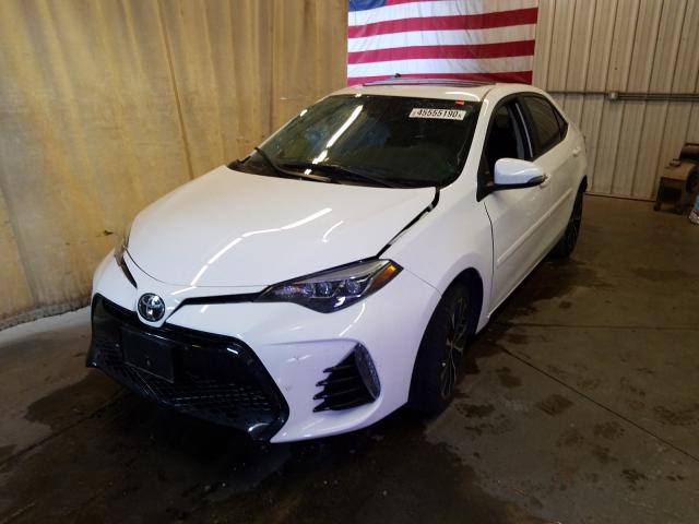 Photo 1 VIN: 2T1BURHE8KC140839 - TOYOTA COROLLA L 