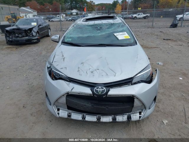 Photo 5 VIN: 2T1BURHE8KC154157 - TOYOTA COROLLA 