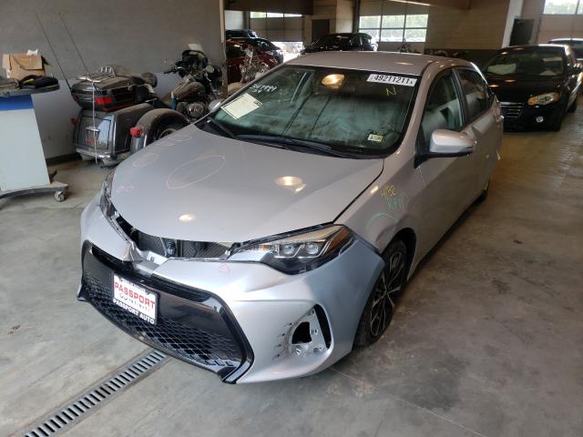 Photo 1 VIN: 2T1BURHE8KC169905 - TOYOTA COROLLA L 