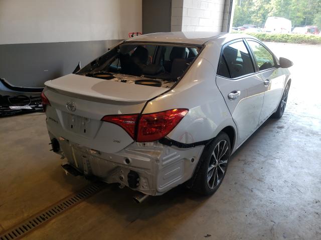 Photo 3 VIN: 2T1BURHE8KC169905 - TOYOTA COROLLA L 