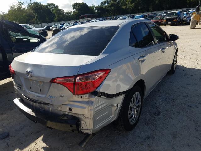 Photo 3 VIN: 2T1BURHE8KC171248 - TOYOTA COROLLA L 