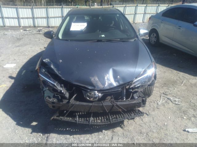 Photo 5 VIN: 2T1BURHE8KC172271 - TOYOTA COROLLA 