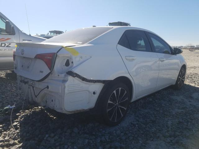 Photo 3 VIN: 2T1BURHE8KC177874 - TOYOTA COROLLA L 