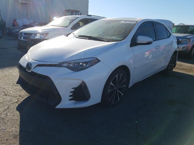 Photo 1 VIN: 2T1BURHE8KC230685 - TOYOTA COROLLA L 