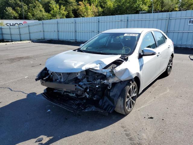 Photo 1 VIN: 2T1BURHE8KC243582 - TOYOTA COROLLA L 