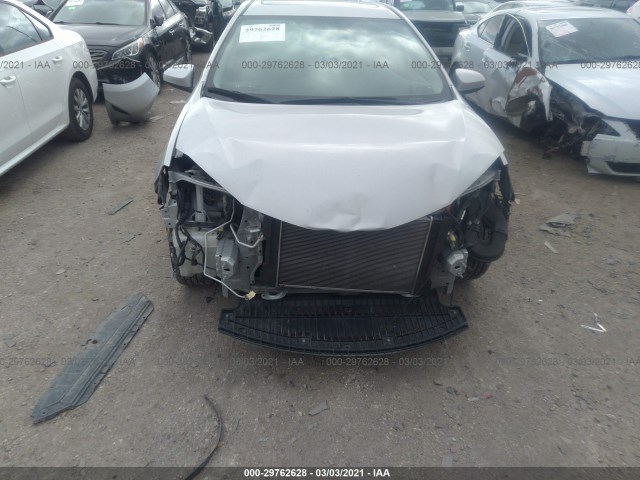 Photo 5 VIN: 2T1BURHE9EC182439 - TOYOTA COROLLA 